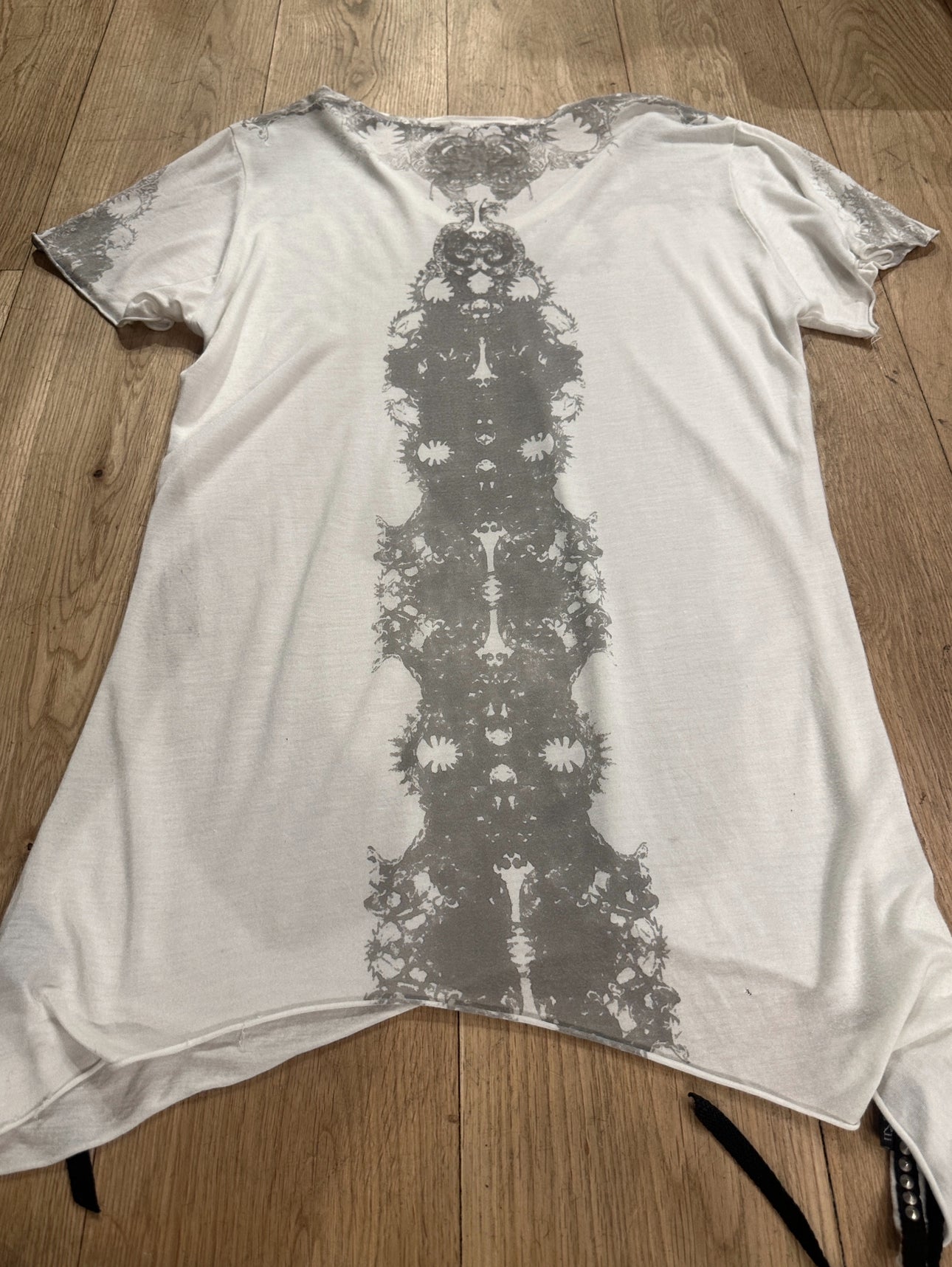 KmRii Asymmetrical Cut Tassel Shirt